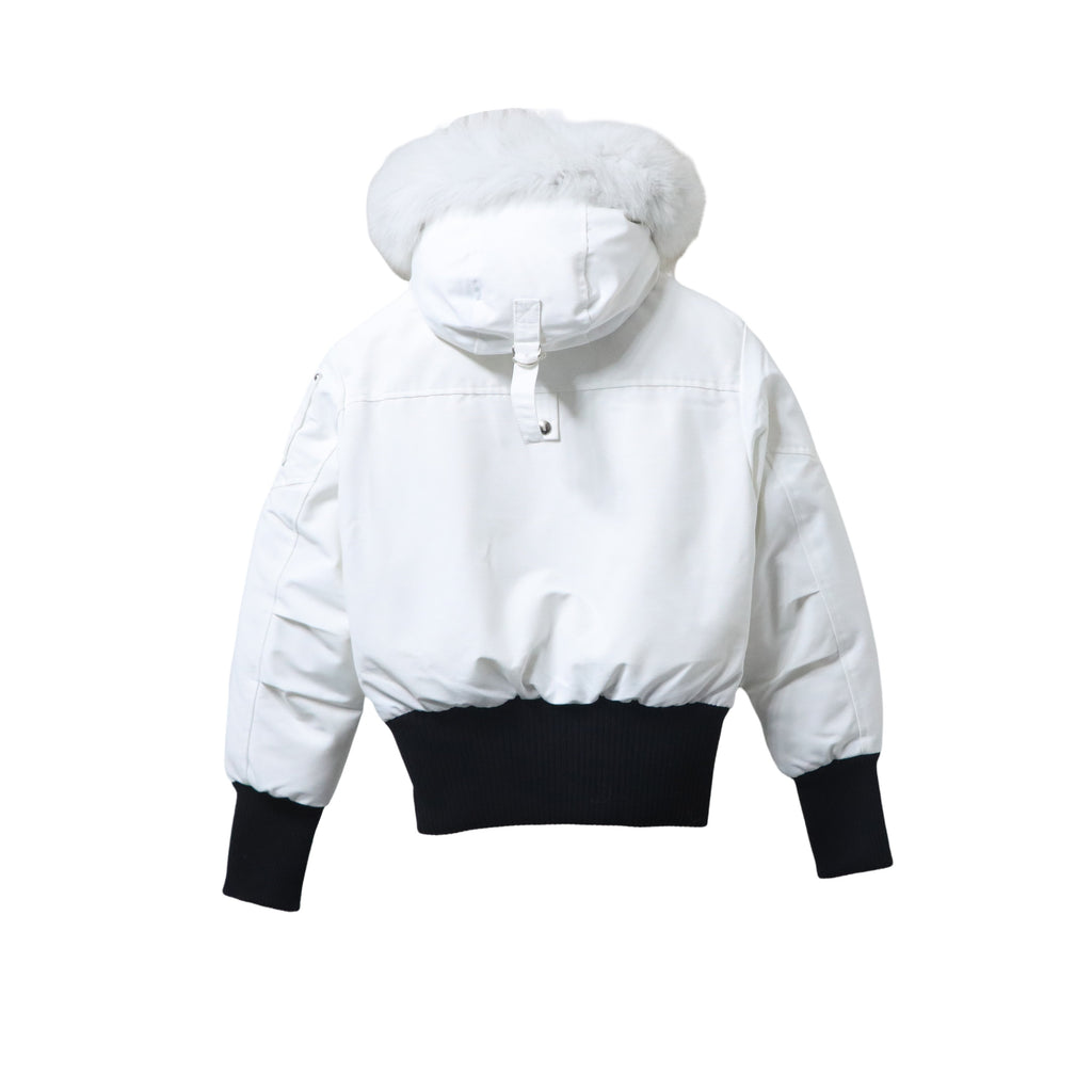 Moose Knuckles White Fur-Trim Hooded Bomber Jacket – White Shell Black Contrast Ribbed Hem White Fur Hood Pom Zip Pull Silver Rivets Ballistic Badge Moose Knuckles Outerwear