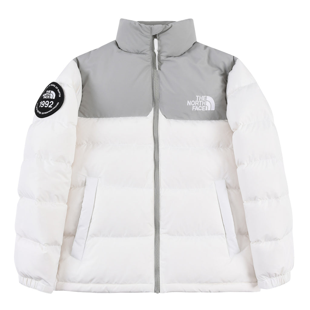 The North Face White Grey 1992 Nuptse 30th Anniversary Down Jacket – 700-Fill White Shell Grey Yoke Colorblock Nuptse Baffle Anniversary Badge TNF Outerwear