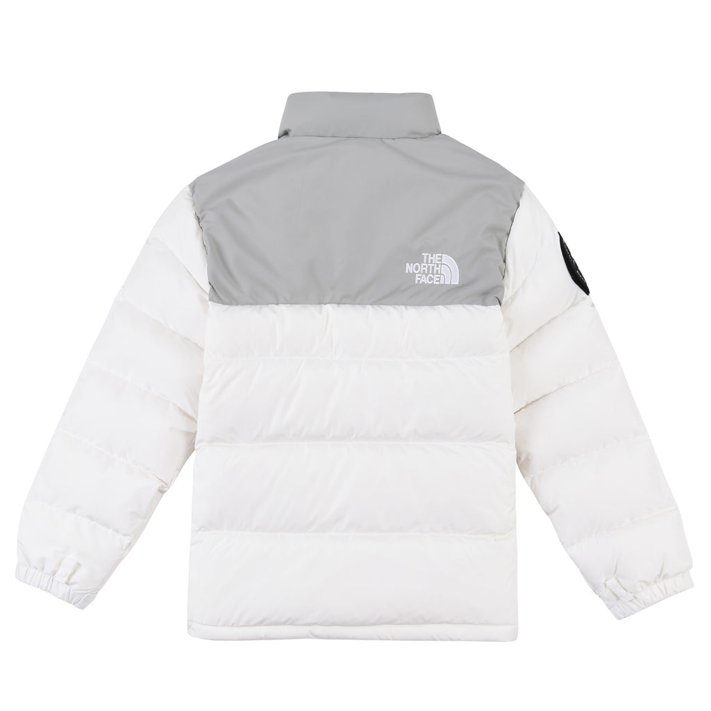 The North Face White Grey 1992 Nuptse 30th Anniversary Down Jacket – 700-Fill White Shell Grey Yoke Colorblock Nuptse Baffle Anniversary Badge TNF Outerwear