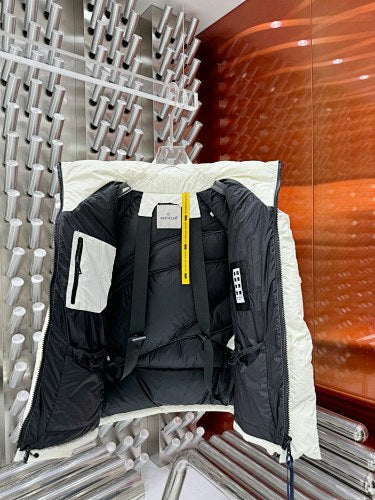 Moncler White Oversized Down Jacket – Black Contrast Badge Diagonal Baffles Funnel Neck Stow Hood Black Interior Lining Moncler Outerwear