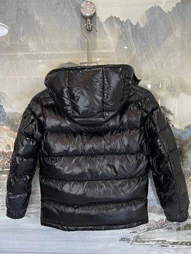 Moncler Black Classic Down Hooded Jacket – High-Gloss Lacquered Shell Wide Baffles Integrated Hood Comic-Strip Label Moncler Outerwear