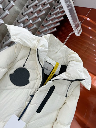 Moncler White Oversized Down Jacket – Black Contrast Badge Diagonal Baffles Funnel Neck Stow Hood Black Interior Lining Moncler Outerwear