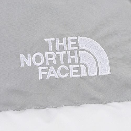 The North Face White Grey 1992 Nuptse 30th Anniversary Down Jacket – 700-Fill White Shell Grey Yoke Colorblock Nuptse Baffle Anniversary Badge TNF Outerwear