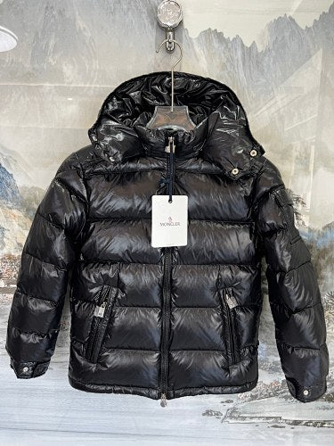 Moncler Black Classic Down Hooded Jacket – High-Gloss Lacquered Shell Wide Baffles Integrated Hood Comic-Strip Label Moncler Outerwear