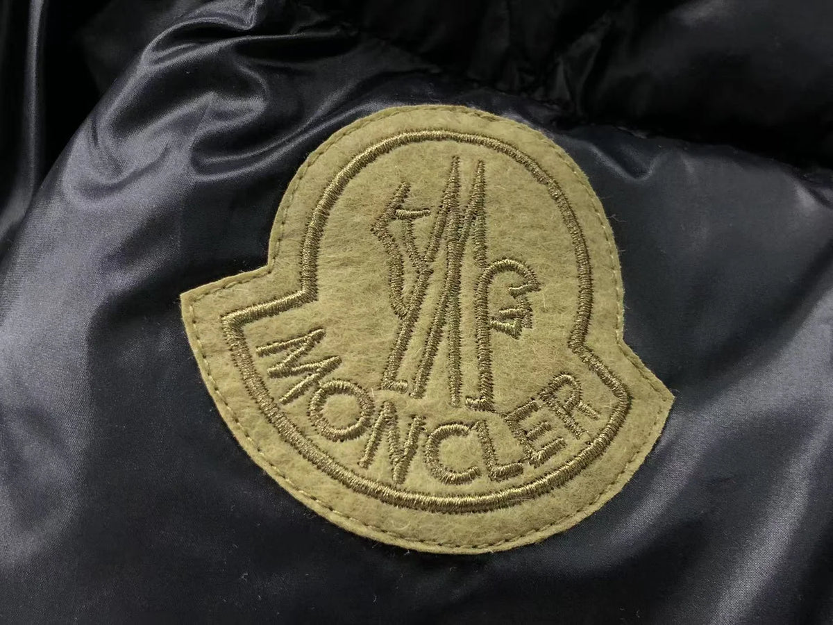 Moncler Black Diamond-Quilted Down Jacket – Oversized Gold Embroidered Badge High Stand Collar Hidden Snap Placket Khaki Interior Moncler Outerwear