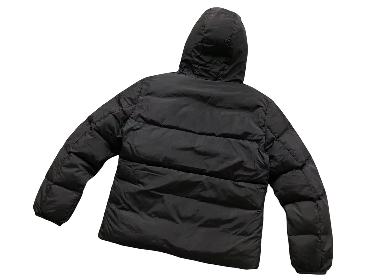 Moncler Black Oversized Down Jacket – All-Caps Logo Hood Brim Diagonal Baffles Matte Shell Chest Zip Pockets Comic-Strip Label Moncler Outerwear